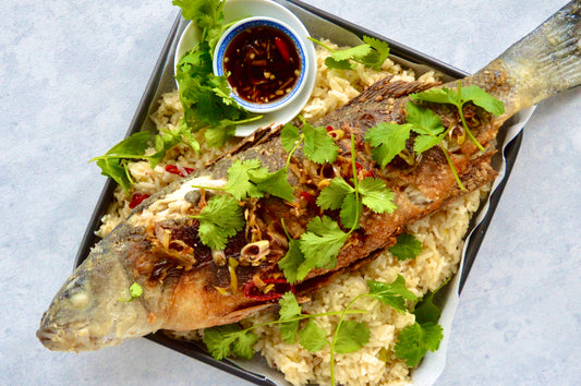 Crispy thai fried seabass on coconut rice - Pesky