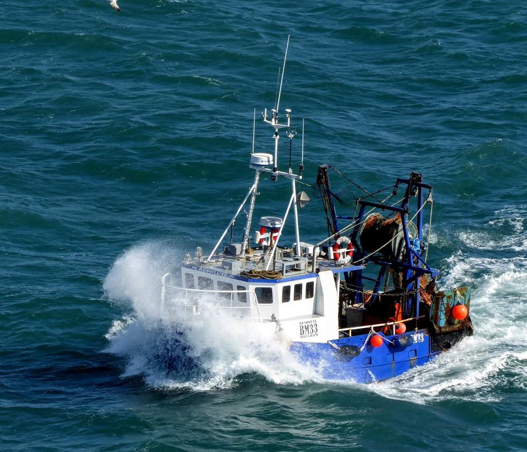 Fishing vessel Resolute returning to port in high seas - Pesky